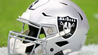 Detailed view of a Raiders helmet.