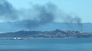 Smoke over the Chevron Richmond Refinery.