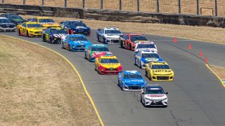 Cars racing at Sonoma Raceway.