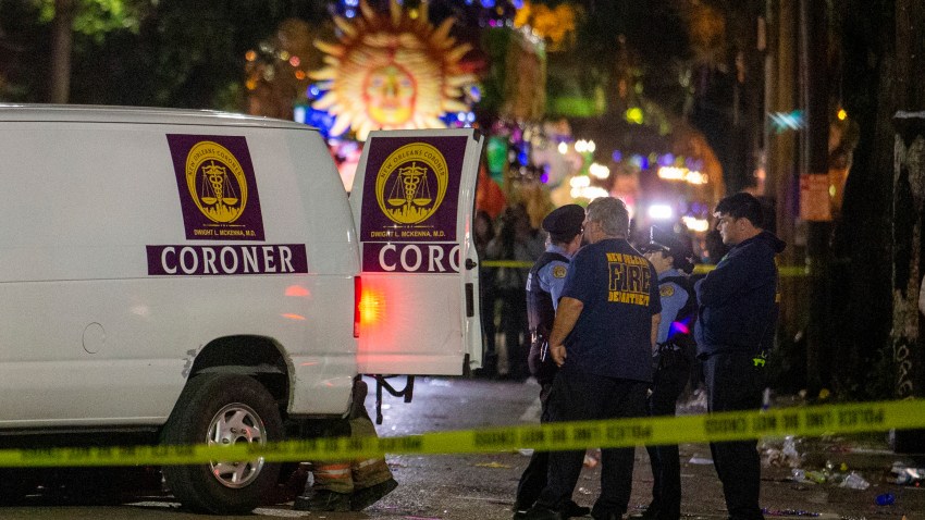 Emergency personnel work the scene after a person was run over and killed by a float in the Mystic Krewe of Nyx parade during Mardi Gras celebrations in New Orleans, Wednesday, Feb. 19, 2020.