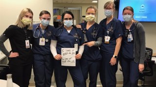 Dr. Halleh Akbarnia with some of her colleagues in the emergency room.