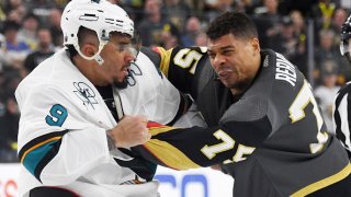 Evander Kane #9 of the San Jose Sharks and Ryan Reaves #75 of the Vegas Golden Knights
