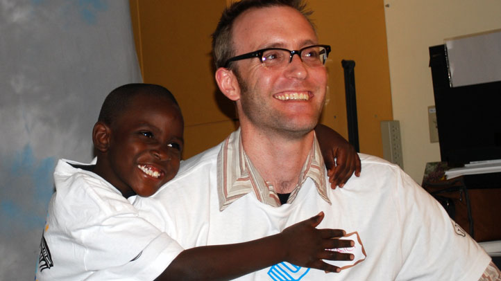 kid-hugging-man