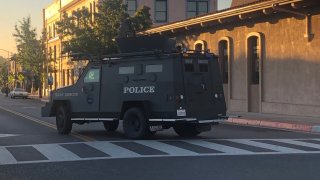 An armored SWAT vehicle responds to a shooting.