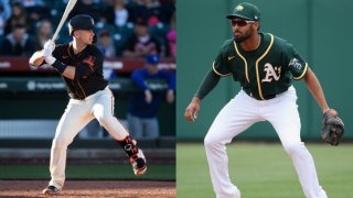 Giants catcher Buster Posey and A's shortstop Marcus Semien