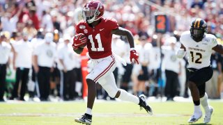 Henry Ruggs III #11 of the Alabama Crimson Tide runs for a touchdown after catching a pass during a game against the Southern Mississippi Golden Eagles at Bryant-Denny Stadium on September 21, 2019 in Tuscaloosa, Alabama. Alabama defeated Southern Miss 49-7. (Photo by Joe Robbins/Getty Images)