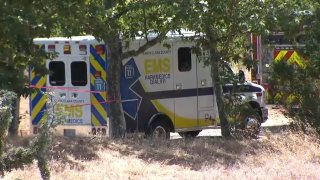 Emergency crews are at the scene of a body found in the river in San Jose. (June 26, 2020)