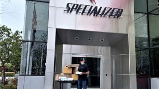 Specialized Bikes founder Mike Sinyard met a shipment of masks at the company’s Morgan hill headquarters last week. (April 16, 2020)