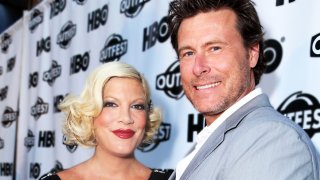 LOS ANGELES, CA – JULY 07: Tori Spelling and husband Dean McDermott (Photo by Alexandra Wyman/WireImage)