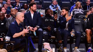 Klay Thompson #11, Draymond Green #23, and Stephen Curry #30 of the Golden State Warriors. (Photo by Noah Graham/NBAE via Getty Images)