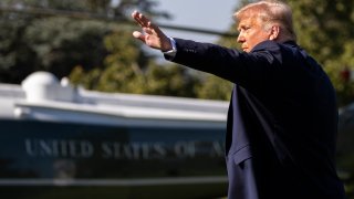 President Donald Trump waves as he walks to Marine One on the South Lawn of the White House, Wednesday, July 29, 2020, in Washington. Trump is en route to Texas.