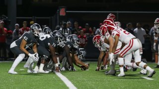 Presnap during a high school football game between the Mater Dei Monarchs and the St. John Bosco Braves.