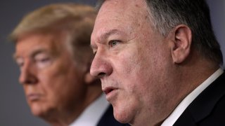 In this March 20, 2020, file photo, Secretary of State Mike Pompeo speaks as President Donald Trump listens during a news briefing on the latest development of the coronavirus outbreak in the U.S. at the James Brady Press Briefing Room at the White House in Washington, DC.