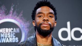 In this Nov. 24, 2019, file photo, Chadwick Boseman poses in the press room during the 2019 American Music Awards at Microsoft Theater in Los Angeles, California.