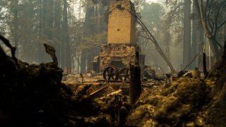 Remains of the Big Basin Redwoods State Park Headquarters and Visitor Center after a wildfire tore through the park.