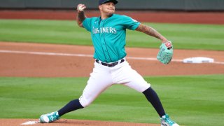 SEATTLE, WASHINGTON – JULY 31: Taijuan Walker #99 of the Seattle Mariners pitches in the first inning against the Oakland Athletics during their Opening Day game at T-Mobile Park on July 31, 2020 in Seattle, Washington. (Photo by Abbie Parr/Getty Images)