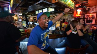 A sports fan inside Ricky's Sports Theatre & Grill in San Leandro.