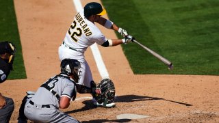 Ramón Laureano of the Oakland Athletics grounds into a force out.