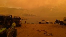 The wildfire is seen approaching the Mammoth Pool Campground on Sept. 5, 2020.