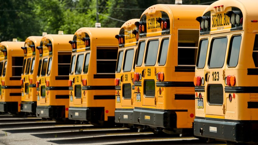 FILE – A line of school buses at Eshelman Transportation in Robeson Township Wednesday afternoon August 5, 2020.