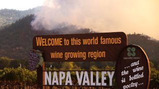 Smoke from the Glass Fire rises from the hills on September 27, 2020 in Calistoga.