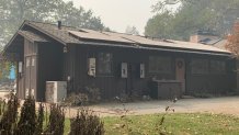 The home of Gerry and Peter Working survived the flames near Crystal Springs Road in St. Helena thanks to firefighters who waged a fierce battle to save it.