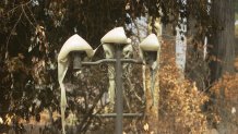 A pole of melted lights shows the intensity of the CZU Lightning Complex Fire.