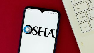In this photo illustration the Occupational Safety and Health Administration (OSHA) logo seen displayed on a smartphone. (Photo Illustration by Rafael Henrique/SOPA Images/LightRocket via Getty Images)