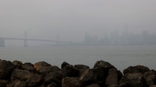 The San Francisco skyline is barely visible through hazy and smoky conditions on September 03, 2020 in San Francisco, California. (Photo by Justin Sullivan/Getty Images)