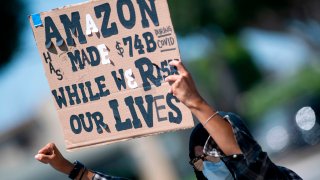 Workers protest against the failure from their employers to provide adequate protections in the workplace of the Amazon delivery hub