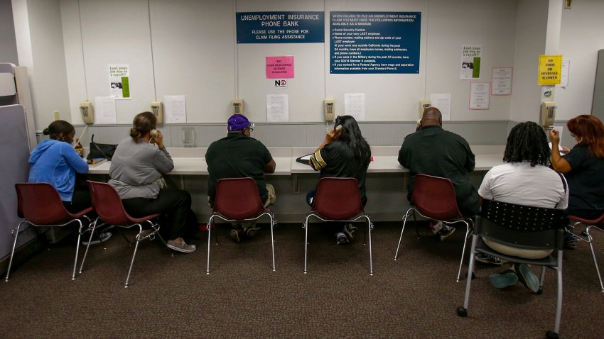 FILE – In this Sept. 20, 2013, file photo, visitors use the Unemployment Insurance phone bank at the California Employment Development Department, EDD office in Sacramento, Calif.California’s unemployment benefits agency has sent out at least 38 million pieces of mail containing Social Security numbers since the start of the coronavirus pandemic, putting residents at risk of identity theft, according to a state audit released Thursday, Nov. 19, 2020. (AP Photo/Rich Pedroncelli, File)
