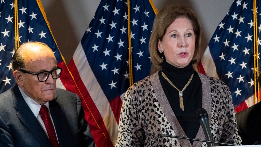 Sidney Powell, right, speaks next to former Mayor of New York Rudy Giuliani, as members of President Donald Trump's legal team, during a news conference at the Republican National Committee headquarters, Thursday Nov. 19, 2020, in Washington.