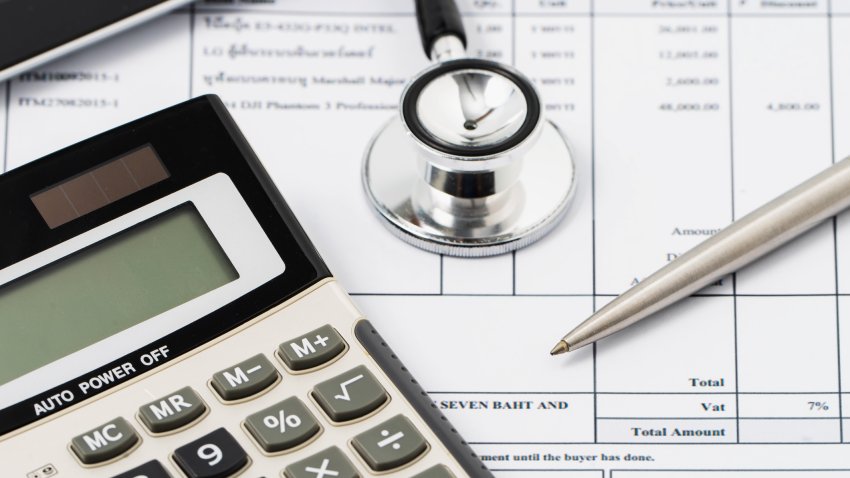 Stock image: medical billing statement on table