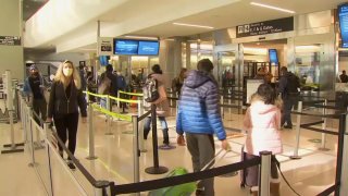 Travelers at San Francisco International Airport.