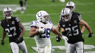 Indianapolis Colts running back Jonathan Taylor runs for a touchdown against the Las Vegas Raiders.