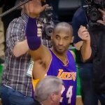 kobe bryant in lakers uniform waves to fans