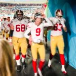 49ers players leave the field dejected