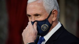 Vice President Mike Pence finishes a swearing-in ceremony for Senators in the Old Senate Chamber at the Capitol in Washington, D.C., U.S. January 3, 2021.