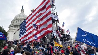 In this Jan. 6, 2021, file photo, supporters of Donald Trump gather outside the Capitol building in Washington D.C.