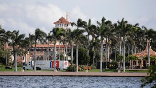 A moving truck is parked outside Mar-a-Lago in Palm Beach, Fla., on Monday, Jan. 18, 2021. President Donald Trump is expected to return to his residence on Wednesday, Jan. 20.
