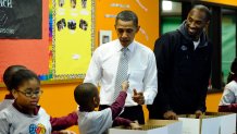 US President Barack Obama (C) and Kobe Bryant of Los Angeles Lakers join children to pack gifts for troops and homeless people at a Boys and Girls Club in Washington on December 13, 2010. Obama welcomed the Lakers to honor their 2009-2010 season and their second consecutive NBA championship. AFP PHOTO/Jewel Samad (Photo credit should read JEWEL SAMAD/AFP via Getty Images)
