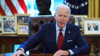 President Joe Biden speaks before signing executive orders on health care in the Oval Office.
