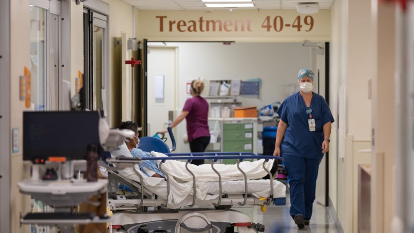 File Image: A patient with Covid-19 in the hallway at the emergency department of Sharp Memorial Hospital in San Diego, California, U.S., on Thursday, Jan. 28, 2021.