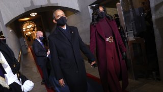 Former President Barack Obama and Michelle Obama arrive at the inauguration of Joe Biden on the West Front of the Capitol on January 20, 2021 in Washington, D.C.