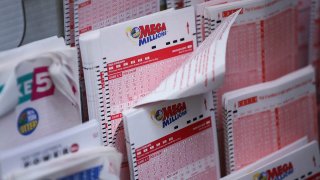 Mega Millions lottery tickets sit inside a convenience store in Lower Manhattan, October 23, 2018 in New York City.