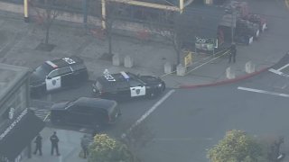 Police in Emeryville block off a scene in an industrial area Monday morning. (Jan. 11, 2021)