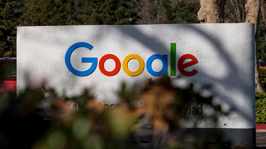 Signage at an entrance to a building on the Google campus in Mountain View, California, U.S., on Wednesday, Dec. 16, 2020. On Wednesday, Texas Attorney General Ken Paxton filed an antitrust lawsuit against Alphabet Inc.'s Google. At its center is a bold claim: Google colluded with archrival Facebook Inc. in an illegal deal to manipulate auctions for online advertising, an industry the two companies dominate.