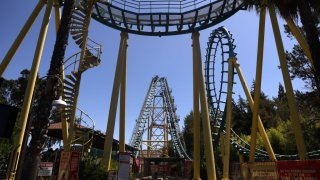 VALLEJO, CALIFORNIA – JULY 02: A roller coaster sits idle at Six Flags Discovery Kingdom on July 02, 2020 in Vallejo, California. Six Flags Discovery Kingdom officially reopened today after being shut down since early March due to the coronavirus COVID-19 pandemic. The theme park is reopening with an animals-only experience dubbed “The Marine World Experience” and will have social distancing measures in place for guests. (Photo by Justin Sullivan/Getty Images)