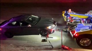 A car being towed following sideshow activity in San Jose.