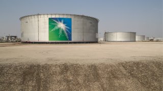 Oil tanks at an oil processing facility of Saudi Aramco, a Saudi Arabian state-owned oil and gas company, at the Abqaiq oil field.